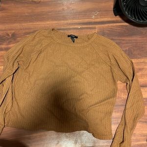 orange ish brown sweater